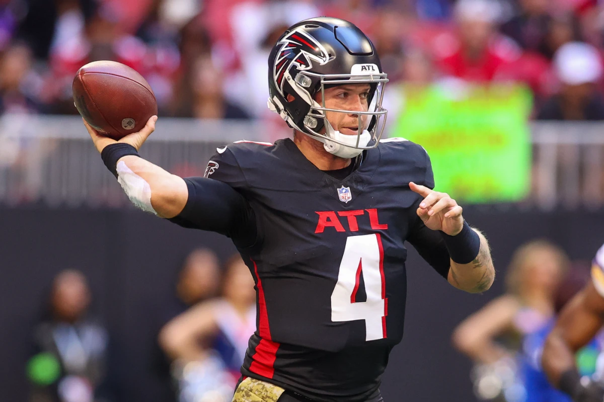 Atlanta Falcons quarterback Taylor Heinicke attempts a pass against the Minnesota Vikings in Week 9.
